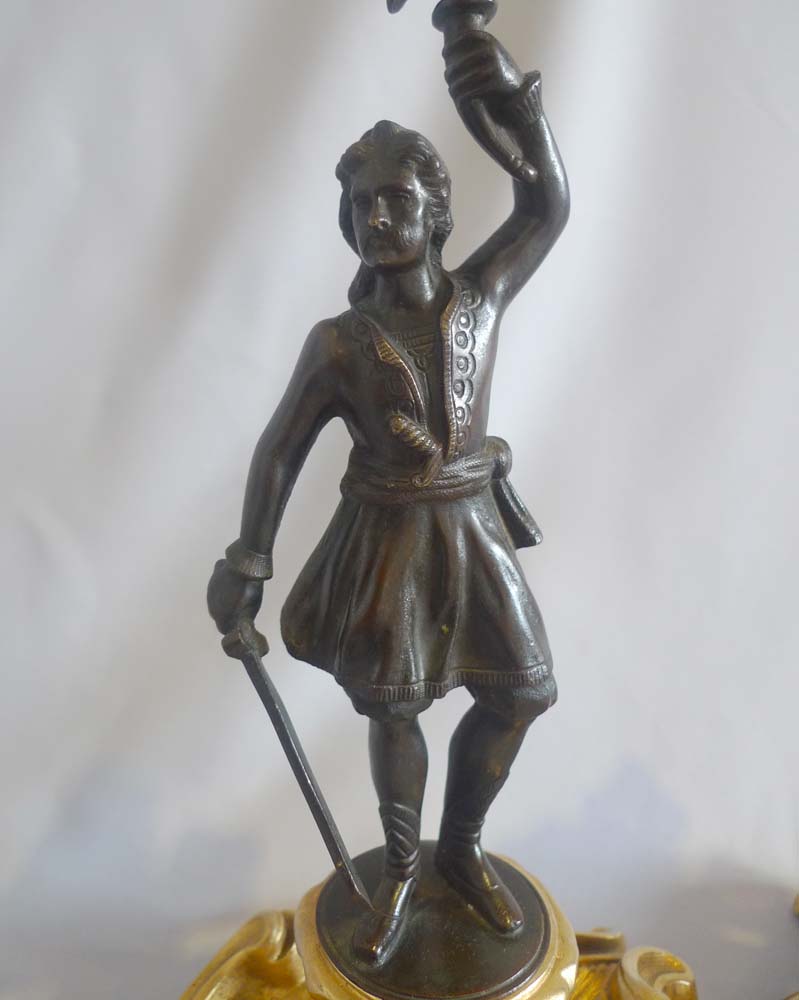 Antique pair Greek Revolution Hellenistic figural candlesticks with figure of hero.
