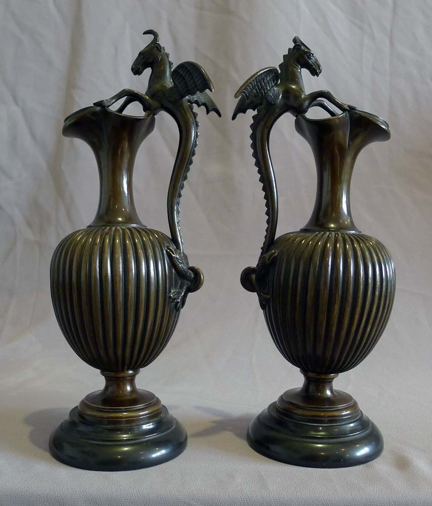 Antique pair of fine patinated bronze and marble urns probably Italian.