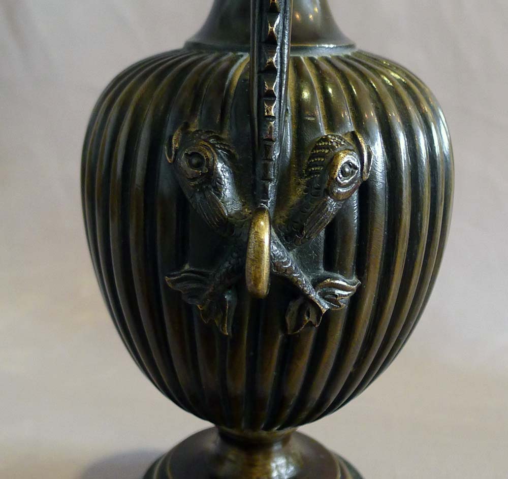 Antique pair of fine patinated bronze and marble urns probably Italian.