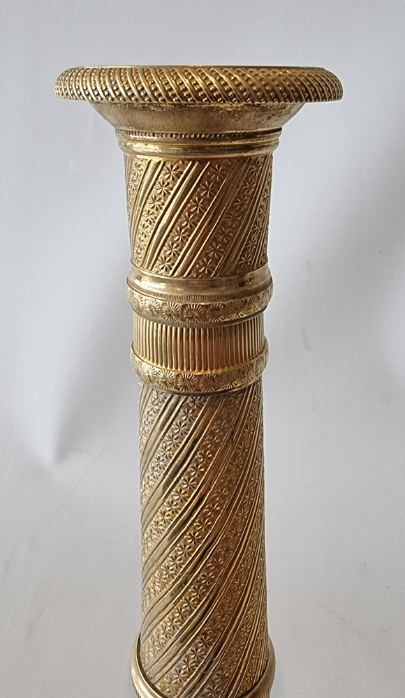 Antique French Empire ormolu candlesticks.