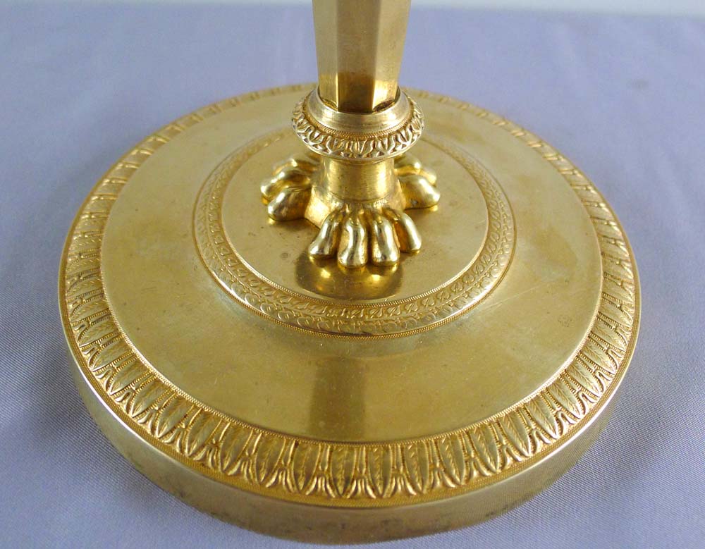 Fine antique French Empire pair of ormolu candlesticks with original hand cut threads.