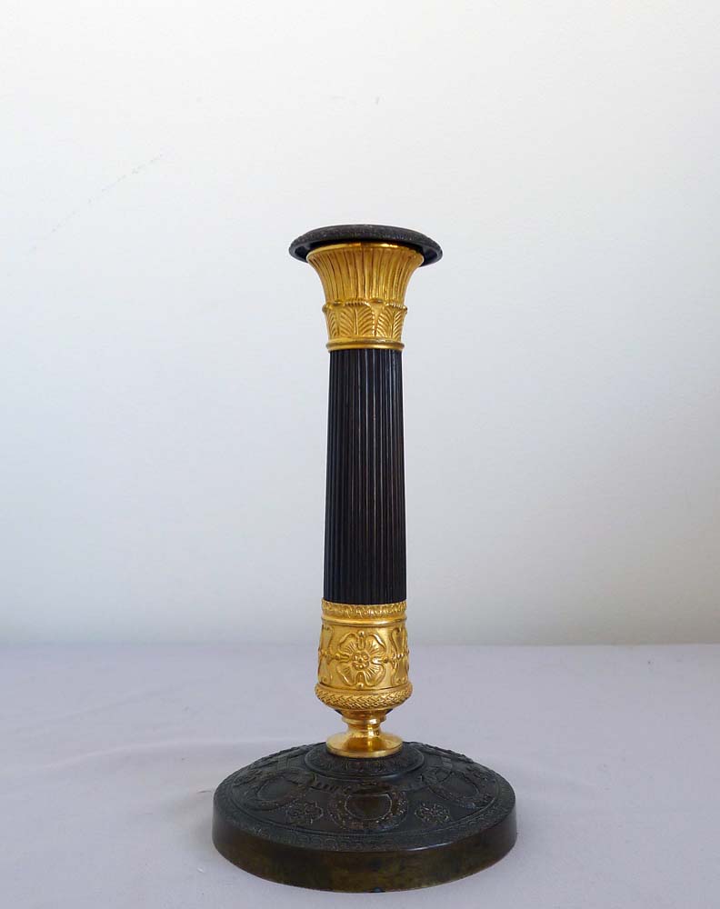 Antique pair French Charles X ormolu and patinated bronze candlesticks.