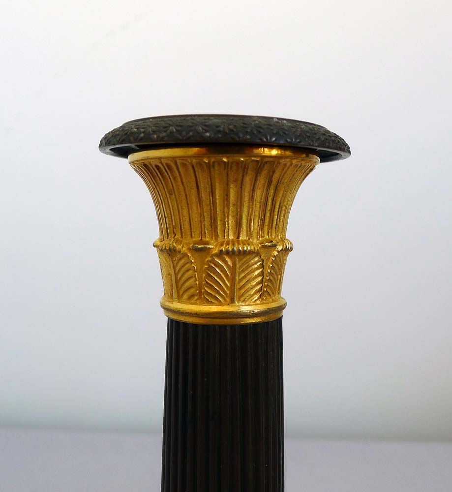 Antique pair French Charles X ormolu and patinated bronze candlesticks.