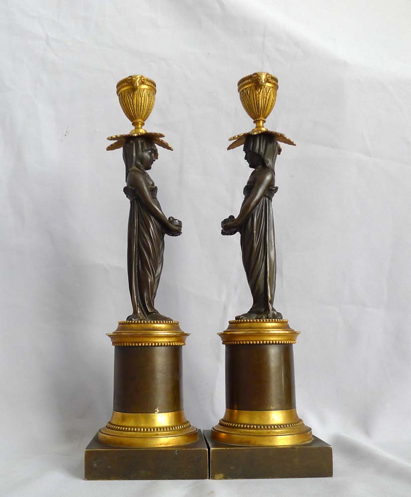 Antique English Regency ormolu and patinated bronze figural candlesticks