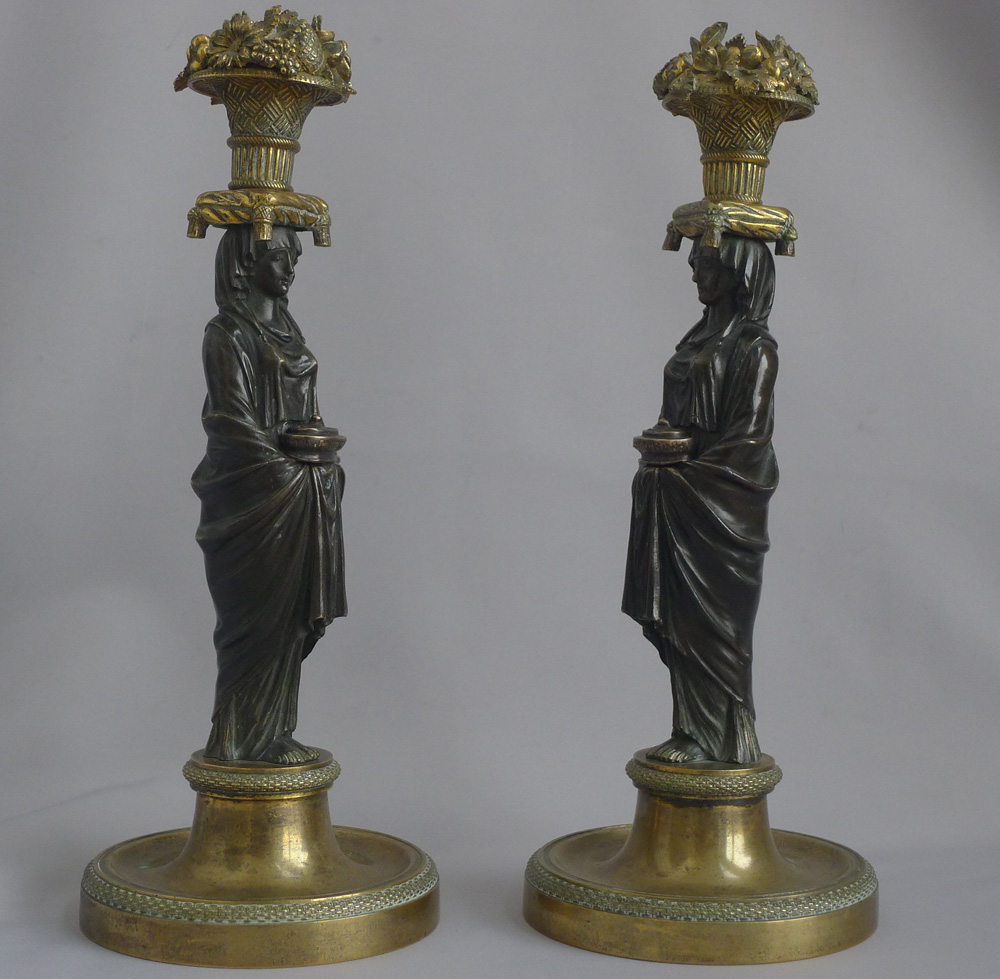 Magnificent pair of English Regency figural candlesticks in the manner of Thomas Hope.
