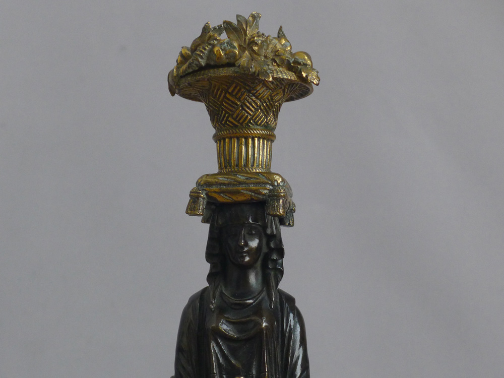 Magnificent pair of English Regency figural candlesticks in the manner of Thomas Hope.
