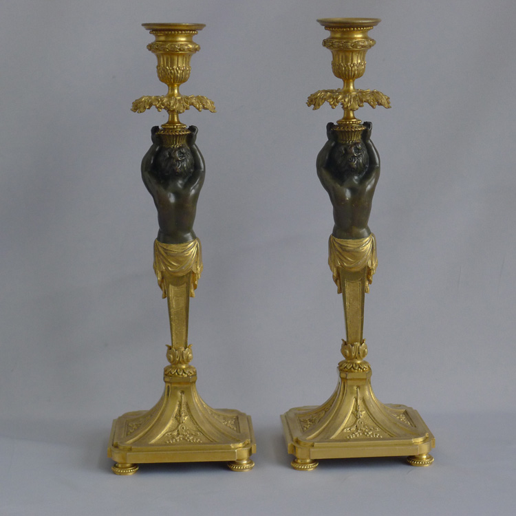 Antique French pair of ormolu and bronze figural candlesticks